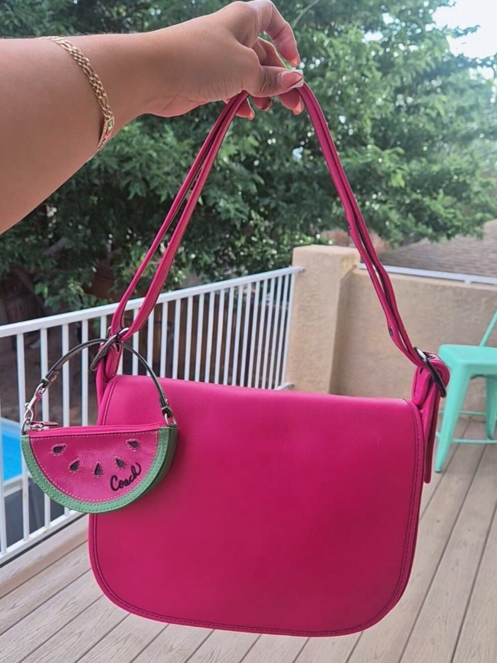 Coach Raspberry color 75th yr Anniversary Saddle Bag. Charm not included!!